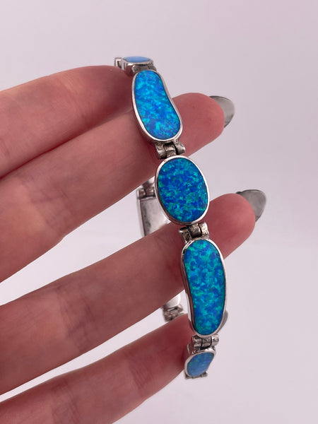 sterling silver 7-1/4" blue opal simulant link bracelet
