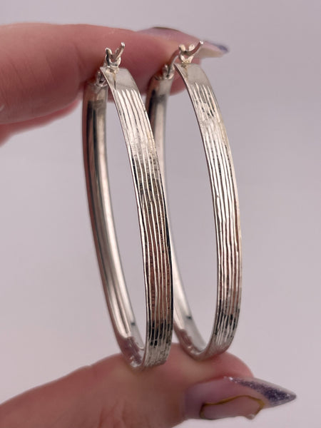 sterling silver  2-1/8" oblong lined hoop earrings