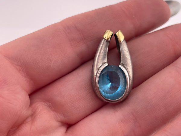 sterling silver & 18k gold faceted blue topaz pendant