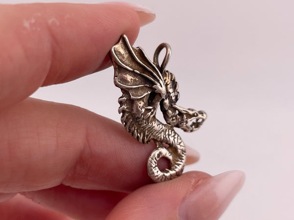 sterling silver double-sided dragon pendant