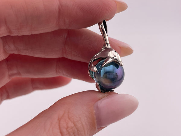 sterling silver dolphin blue glass gazing ball pendant