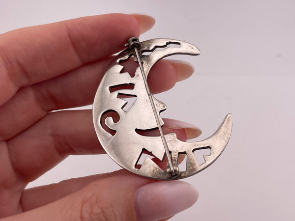 sterling silver man in the crescent moon cut-out design brooch pin