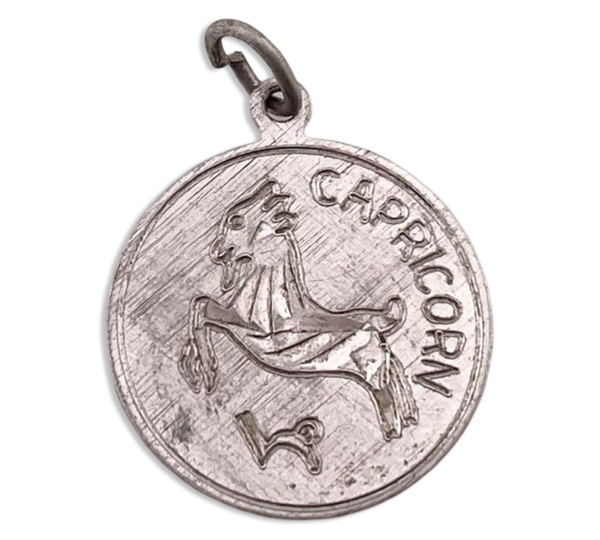 sterling silver etched Capricorn zodiac pendant