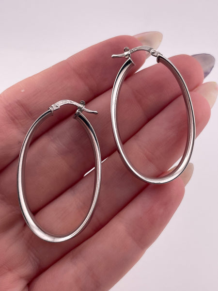 sterling silver 1-1/2" rhodium plated wavy oblong hoop earrings