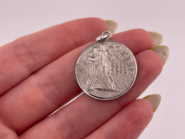 sterling silver Aquarius the Water-Bearer zodiac etched pendant