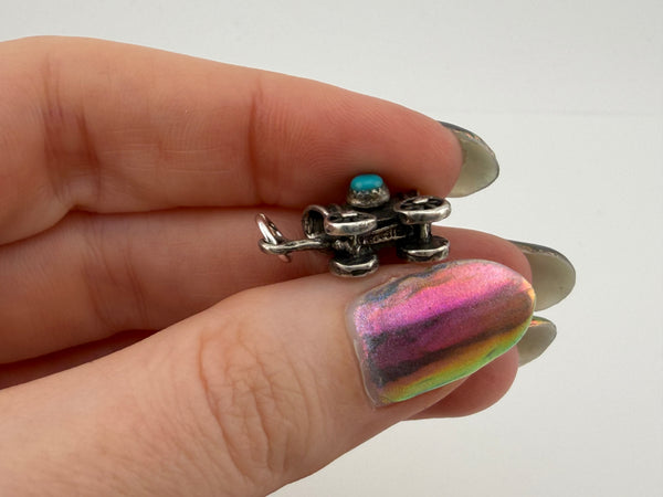 sterling silver covered wagon turquoise pendant