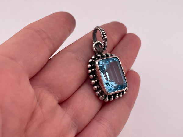 sterling silver faceted lab topaz pendant