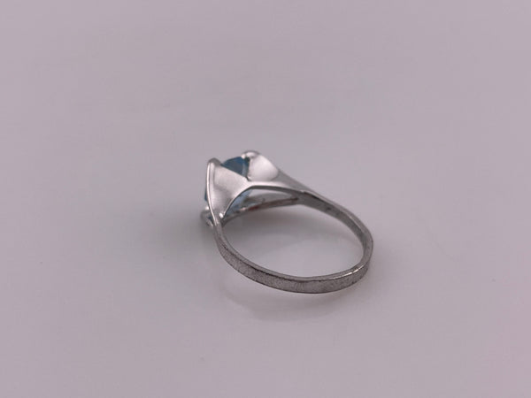 size 6 sterling silver rhodium plated faceted blue plastic ring