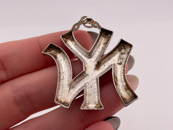 sterling silver large pressed 'NY' New York pendant