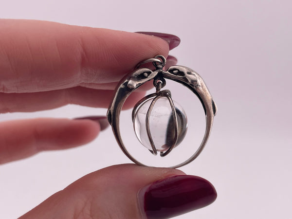 sterling silver quartz orb dolphins pendant