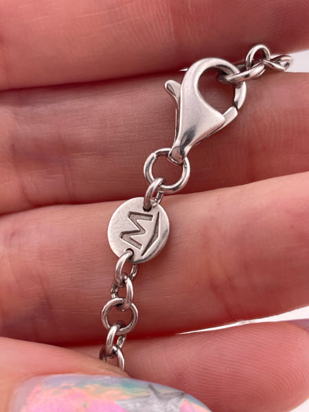 sterling silver designer Movado spacer diamond dangle necklace