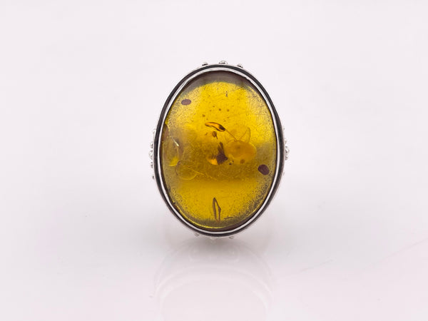 size 7.5 sterling silver scroll design oval amber ring