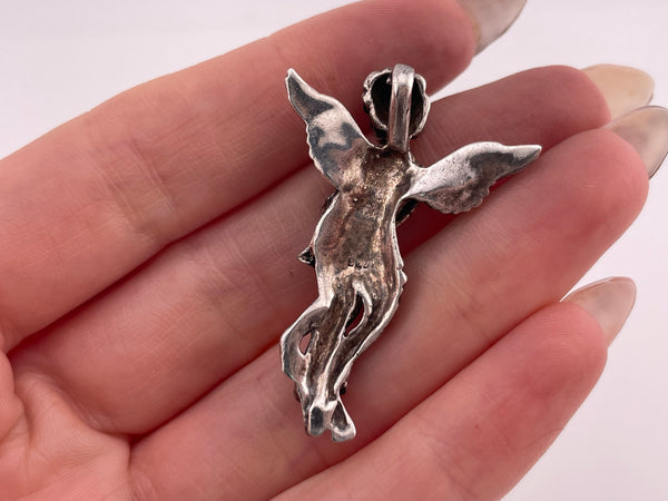sterling silver cherub with instrument pendant