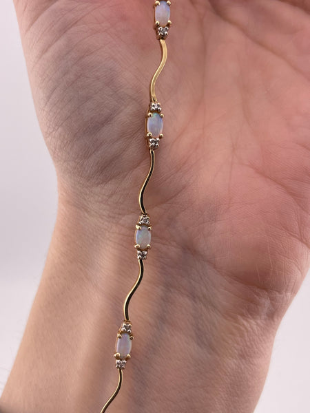 14k yellow gold opal & diamond squiggle link bracelet