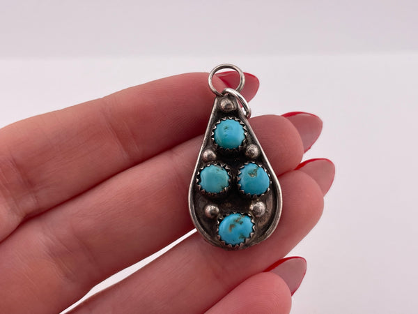 sterling silver four stone turquoise pendant
