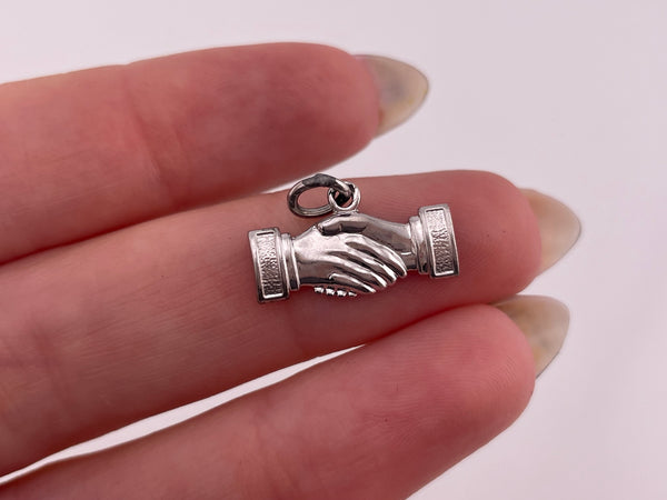 sterling silver rhodium plated shaking hands pendant