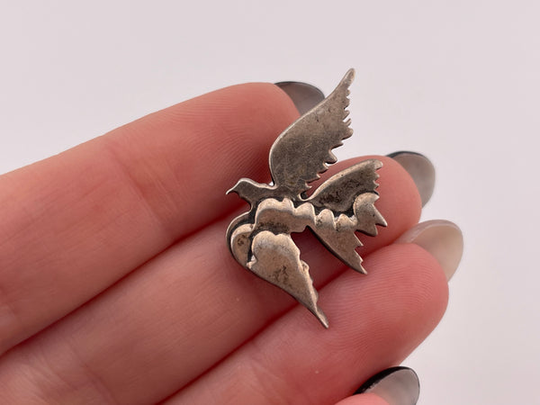 sterling silver soaring bird cloud pendant