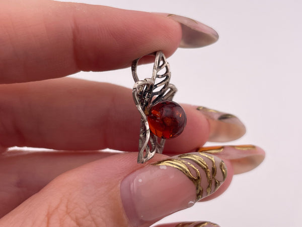 sterling silver amber orb leaf star pendant