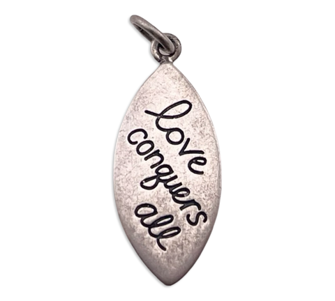 sterling silver 'love conquers all' pendant