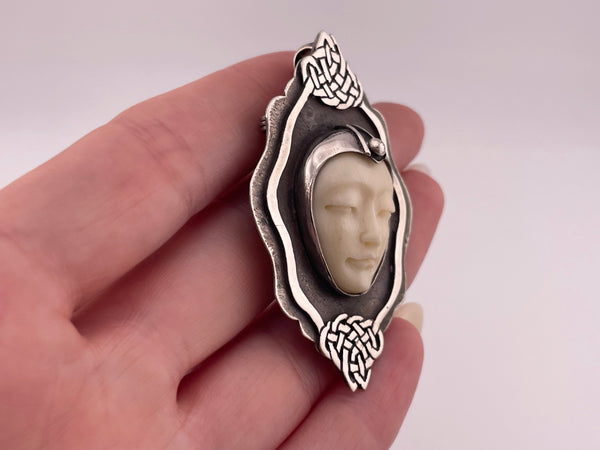 sterling silver molded plastic face pendant brooch