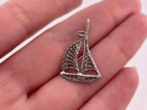 sterling silver sailboat cut-out design pendant