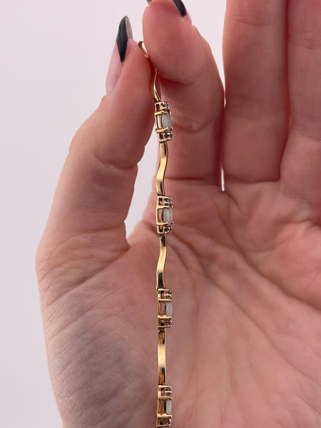 14k yellow gold opal & diamond squiggle link bracelet