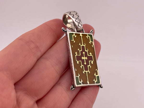 sterling silver crushed stone under resin pendant