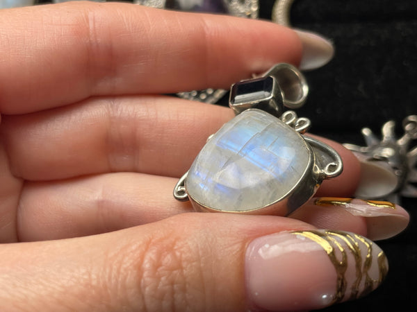 sterling silver rainbow moonstone faceted purple glass pendant
