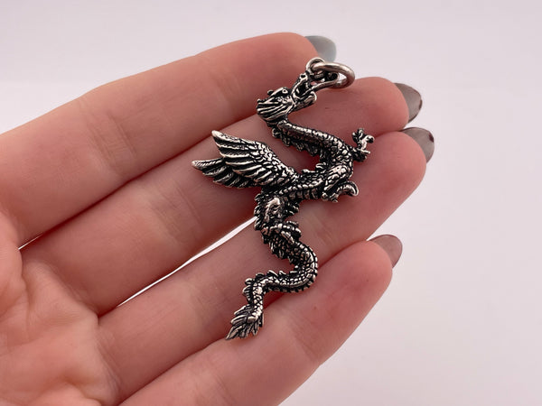 sterling silver dragon facing left pendant