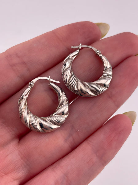 rhodium plated sterling silver textured lined puffy hoop earrings