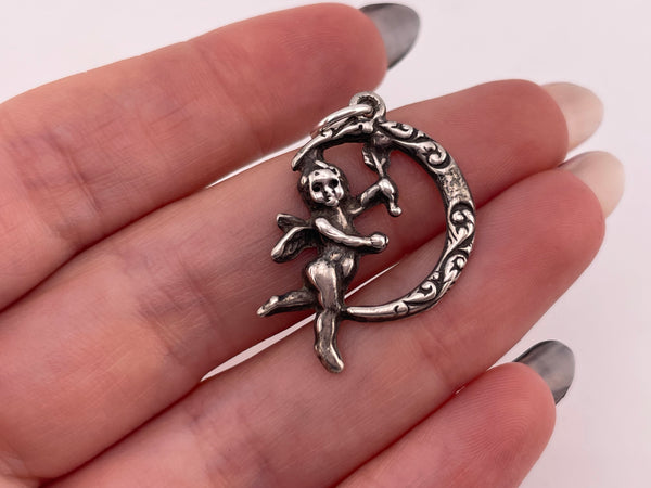 sterling silver cupid moon pendant