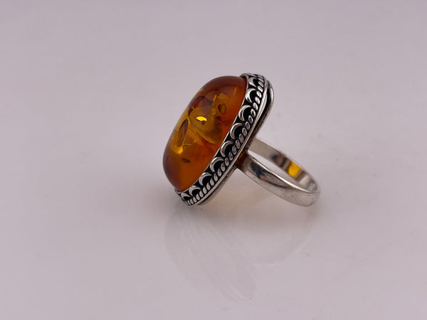 size 8 sterling silver scallop design oval amber ring