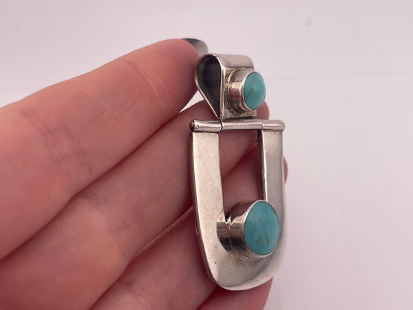 sterling silver synthetic turquoise pendant