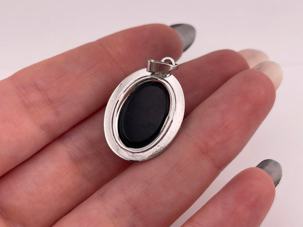 sterling silver rhodium plated plastic cameo pendant