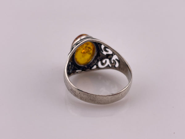 size 12 sterling silver oval amber swirl design ring
