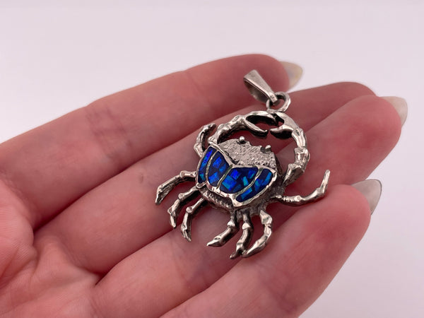 sterling silver mosaic lab opal crab pendant