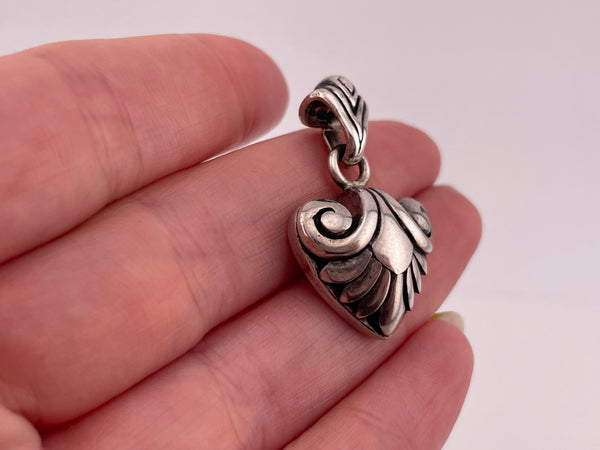 sterling silver stoneless swirl pendant