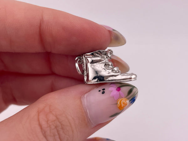 sterling silver rhodium plated baby shoe pendant
