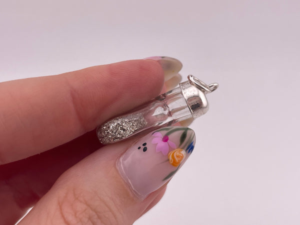 sterling silver silver dust in a bottle pendant