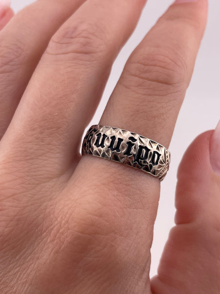 size 10.25 sterling silver “Kuuipo" flower scroll band  ring