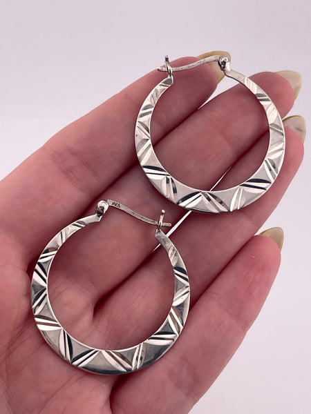 rhodium plated sterling silver 1" textured flat hoop earrings