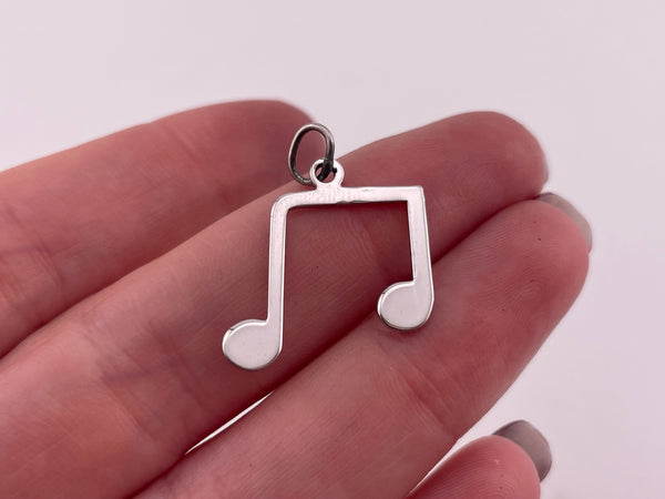 rhodium plated sterling silver music note pendant