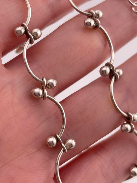 sterling silver curved ball necklace
