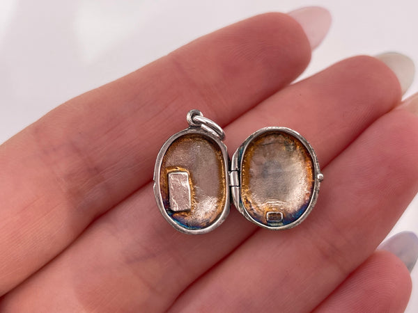 sterling silver rhodium plated 'Liz 2000' oval locket pendant