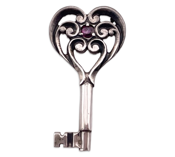 sterling silver faceted lab ruby key pendant