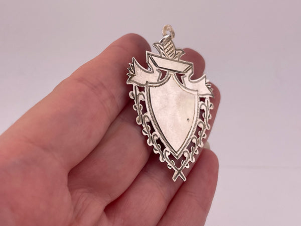 sterling silver thin shield pendant