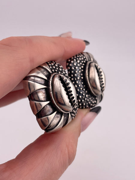 sterling silver Dian Malouf stoneless cowrie shell clip on earrings