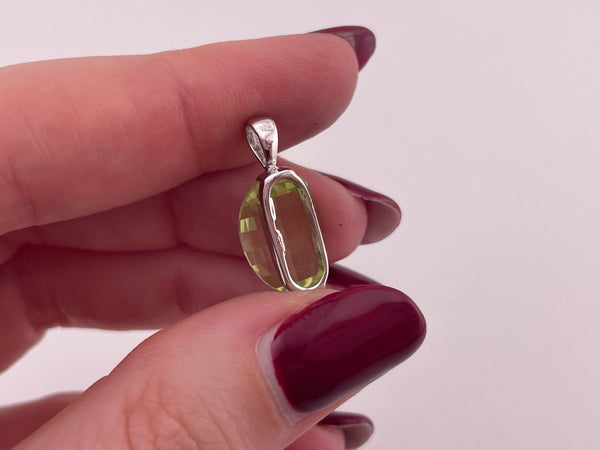 sterling silver yellowish-green faceted glass pendant