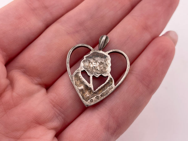 sterling silver flower heart pendant