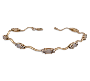 14k yellow gold opal & diamond squiggle link bracelet